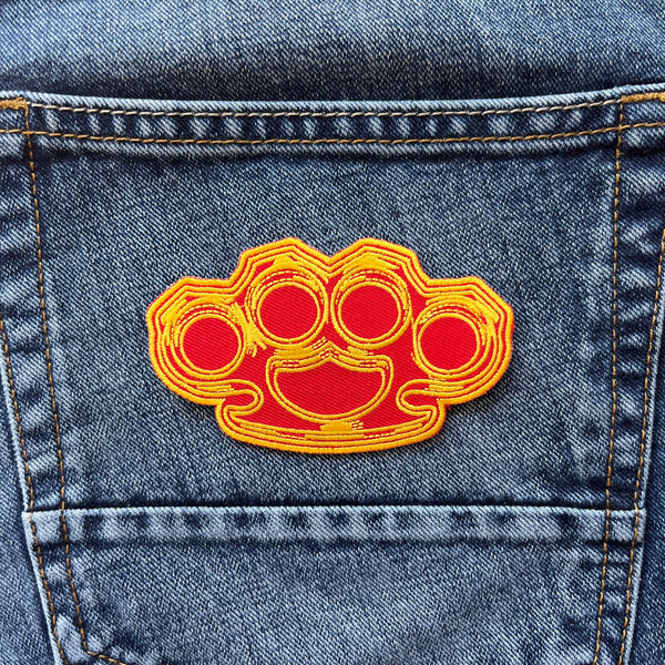 Brass Knuckles in Red and Yellow Patch - PATCHERS Iron on Patch